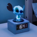 Disney Stitch zegarek z lamka na stoliku nocnym włączona lampka